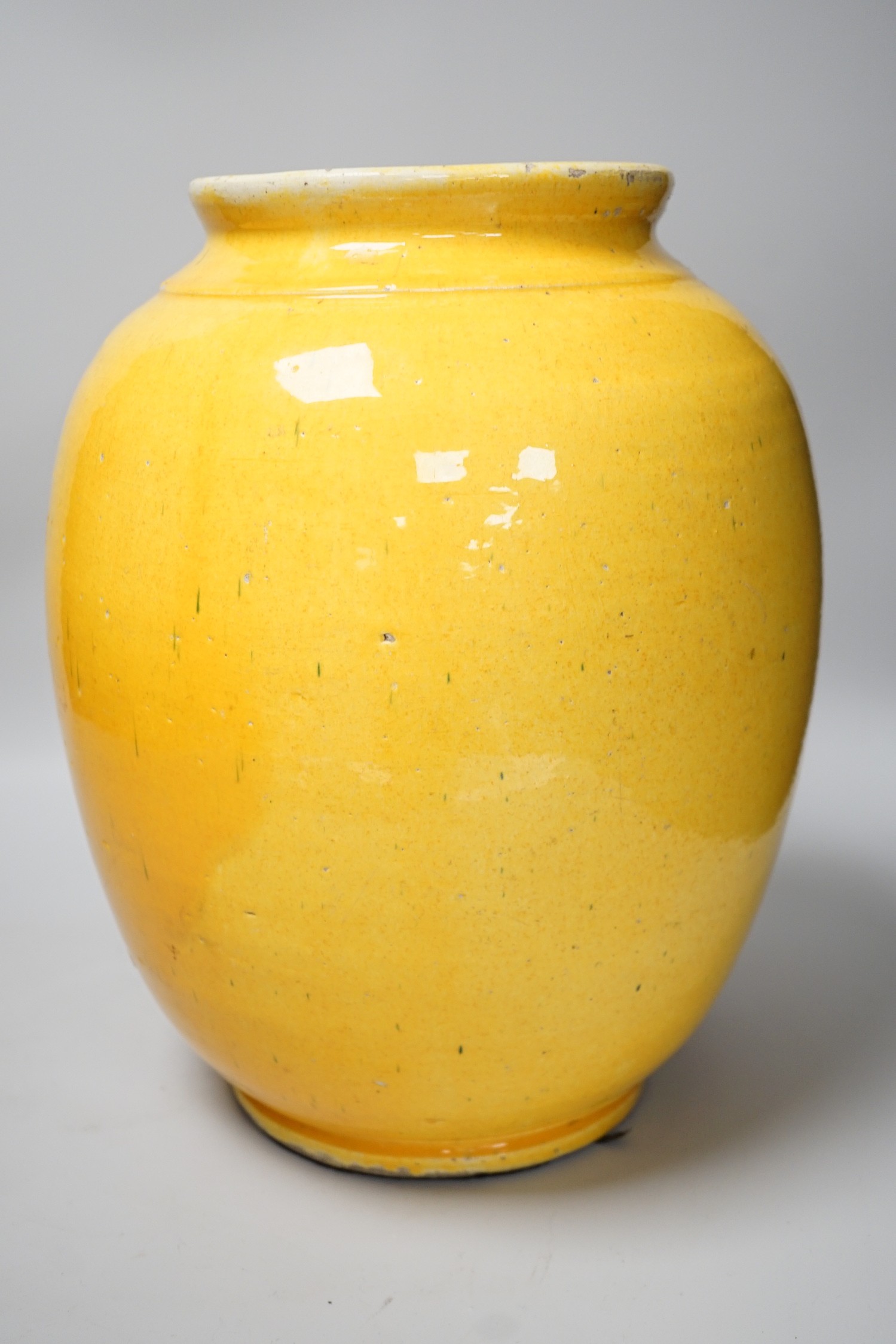 Two Chinese blue and white ginger jars, together with a large Chinese yellow glazed vase, tallest 31cm